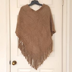 NWT. Sweater Shawl Poncho Pullover with multi patterns.
